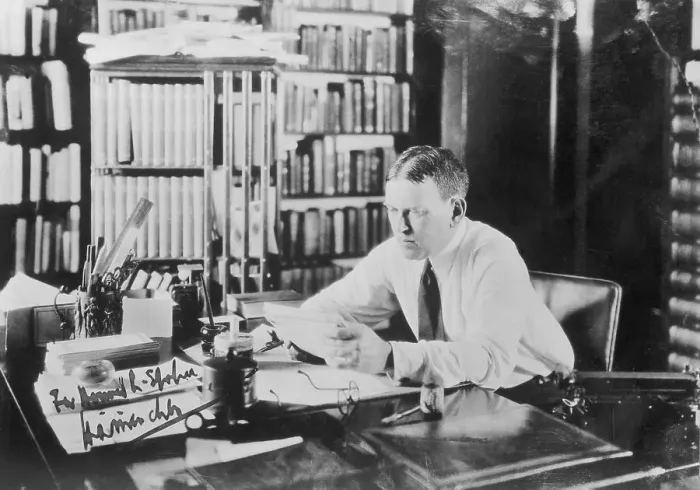 Framed Print : Author H. L. Mencken Reading at His Desk Framed Print : Author H. L. Mencken Reading at His Desk