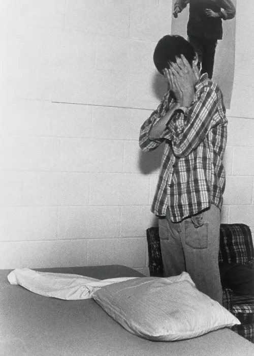 Framed Print : Autistic Young Man Covering His Face in Frustration Framed Print : Autistic Young Man Covering His Face in Frustration