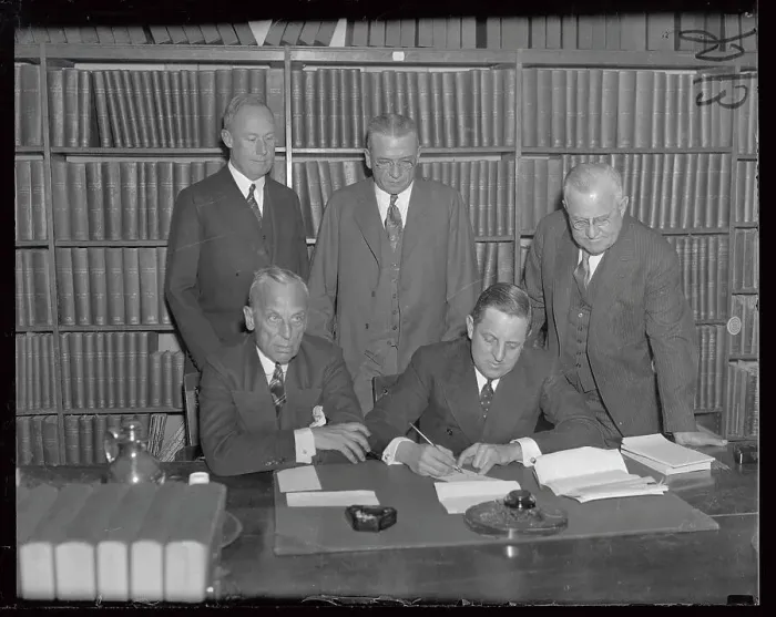 Framed Print : Auto Executives at a Table