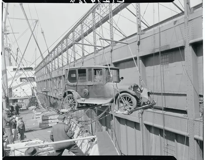 Framed Print : Automobile Being Lowered from Ship Framed Print : Automobile Being Lowered from Ship