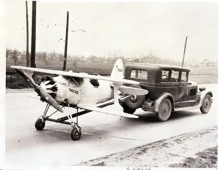Framed Print : Automobile Towing Small Airplane Framed Print : Automobile Towing Small Airplane
