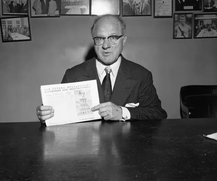 Framed Print : Avery Brundage Holding a Newspaper Framed Print : Avery Brundage Holding a Newspaper