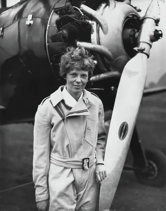 Framed Print : Aviatrix Amelia Earhart Posing by Airplane Framed Print : Aviatrix Amelia Earhart Posing by Airplane