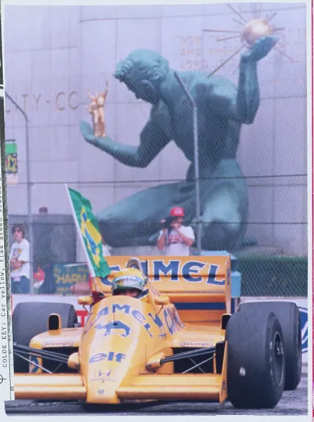 Ayrton Senna Driving with Brazilian Flag in Hand Print. Art Prints