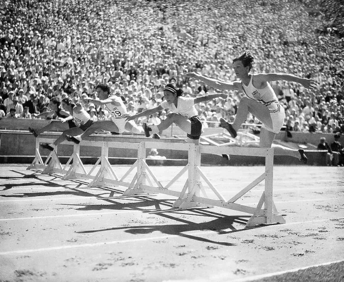 Framed Print : Babe Didrikson Competing in 80-Meter Hurdle Race Framed Print : Babe Didrikson Competing in 80-Meter Hurdle Race