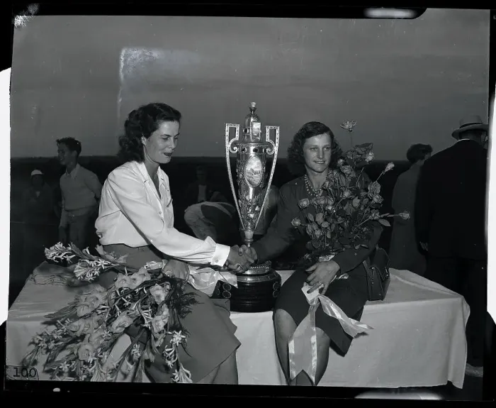 Framed Print : Babe Didrikson Receiving Golf Trophy