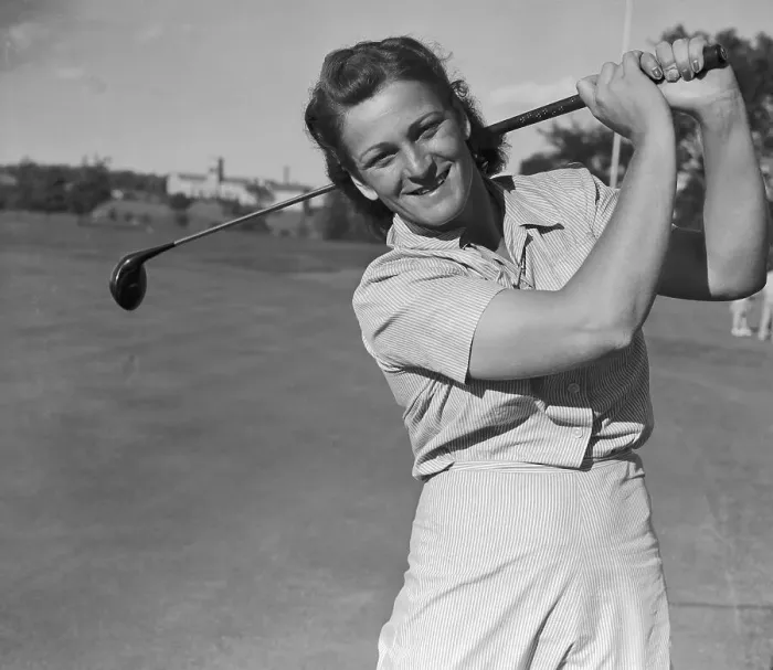 Framed Print : Babe Didrikson Smiling with Golf Club over her Shoulder Framed Print : Babe Didrikson Smiling with Golf Club over her Shoulder