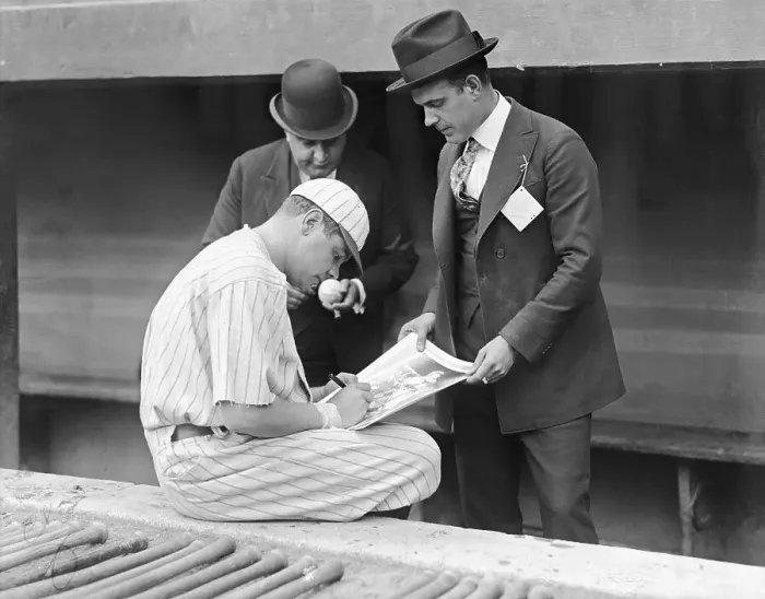 Framed Print : Babe Ruth Autographing Photos Framed Print : Babe Ruth Autographing Photos
