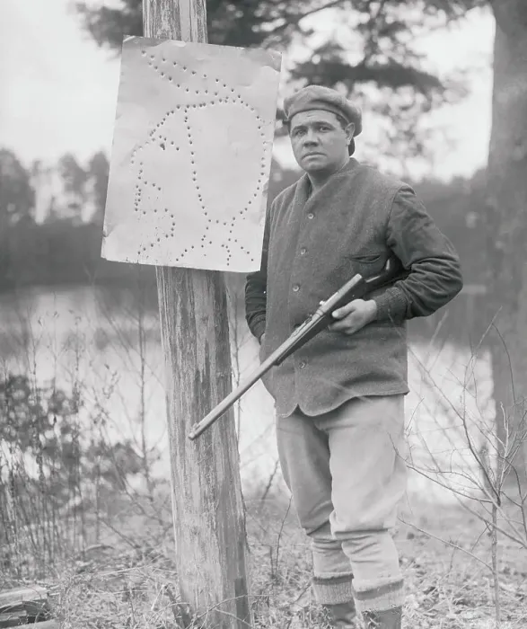 Framed Print : Babe Ruth with Rifle and Native American Target Framed Print : Babe Ruth with Rifle and Native American Target