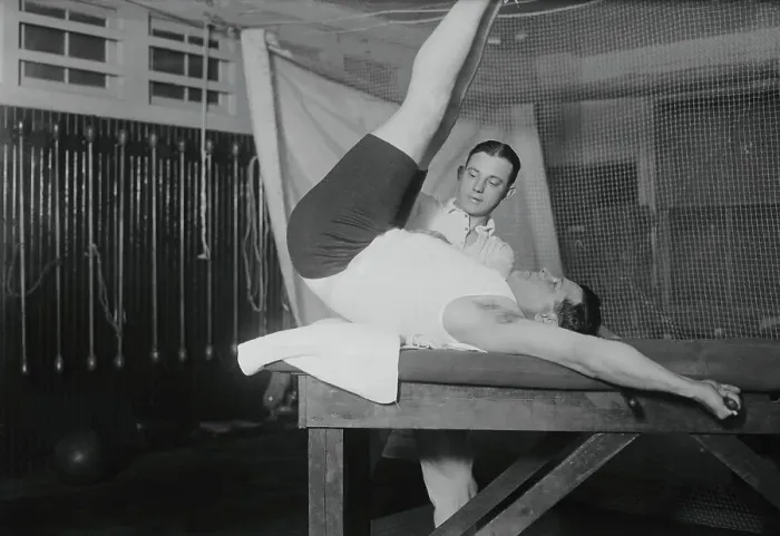 Framed Print : Babe Ruth Stretching with Trainer Framed Print : Babe Ruth Stretching with Trainer