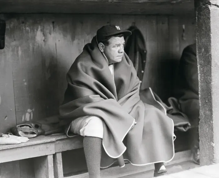 Framed Print : Babe Ruth Wearing Blanket in dugout