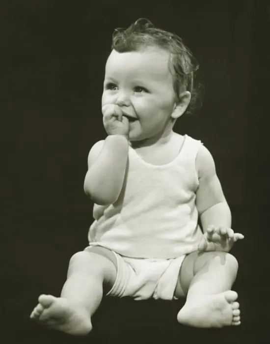 Framed Print : Baby boy (12-18 months) sucking thumb, (B&W), close-up