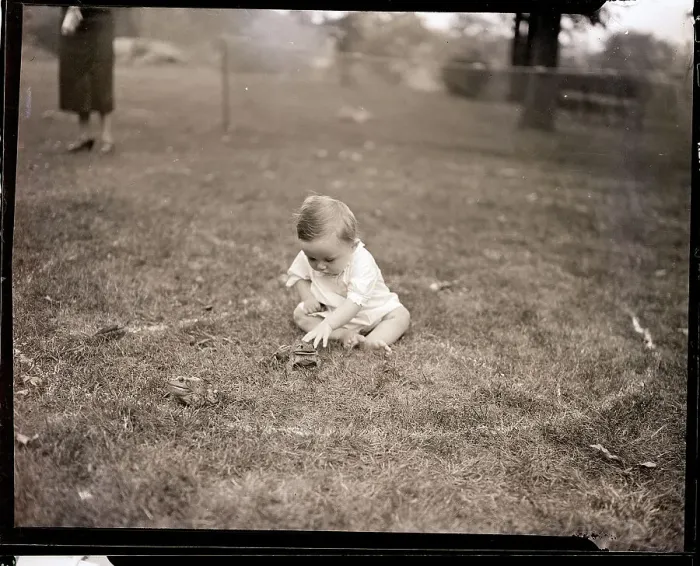 Framed Print : Baby David Conn Petting His Frog Framed Print : Baby David Conn Petting His Frog