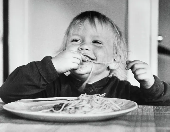 Framed Print : Baby Girl Eating Spaghetti Framed Print : Baby Girl Eating Spaghetti