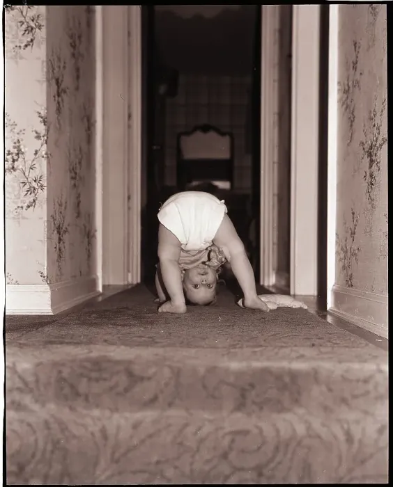 Framed Print : Baby Playing in Hallway Framed Print : Baby Playing in Hallway