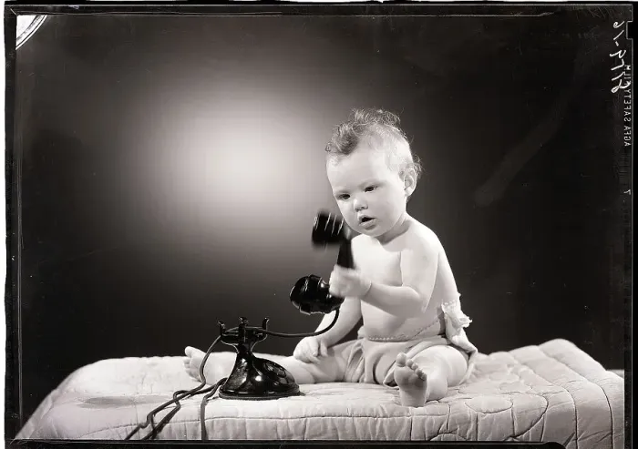 Framed Print : Baby Playing with Telephone Framed Print : Baby Playing with Telephone