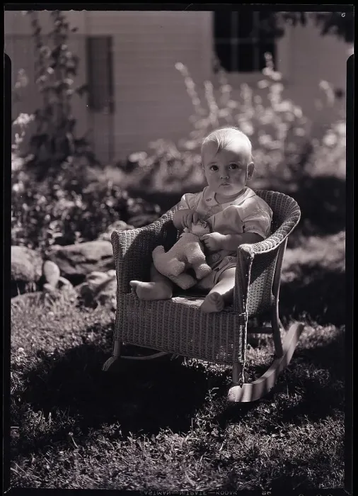 Framed Print : Baby Seating in Wicker Chair Framed Print : Baby Seating in Wicker Chair