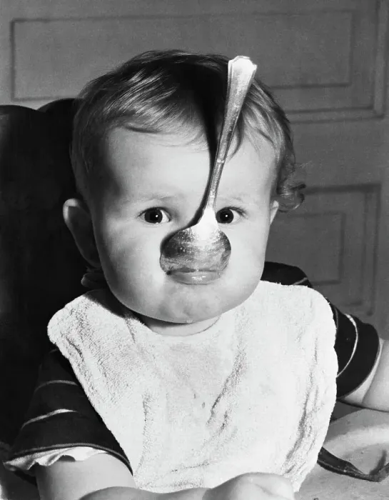 Framed Print : Baby with Spoon in Mouth Framed Print : Baby with Spoon in Mouth