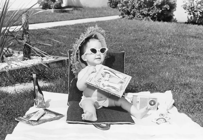 Framed Print : Baby Sunbathing on Lawn Framed Print : Baby Sunbathing on Lawn