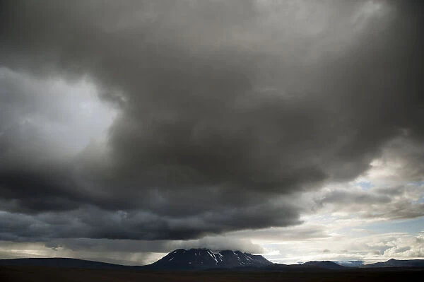 Bad weather, view towards snow-covered mountains and Langjoekull Glacier, highland slopes of Kjoelur or Kjalvegur, Highland, Iceland, Europe