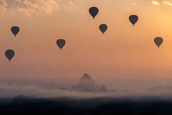 Bagan pagoda with hot air balloons in the morning