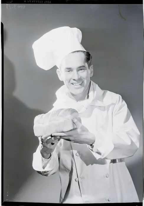 Framed Print : Baker Holding Bread Framed Print : Baker Holding Bread
