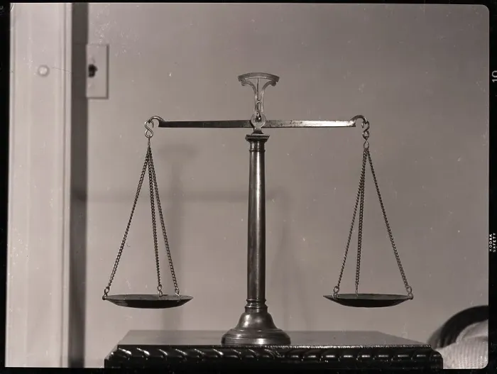Framed Print : Balancing Scales On Table Framed Print : Balancing Scales On Table