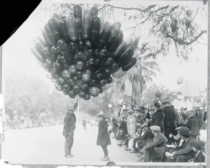 Framed Print : Balloon Merchant at Parade