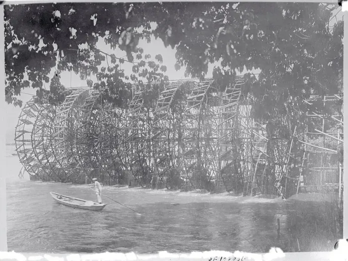 Framed Print : Bamboo Water Wheel and Boater Framed Print : Bamboo Water Wheel and Boater