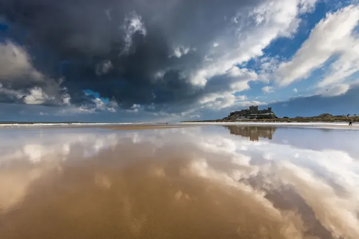 Framed Print : Bamburgh castle and beach reflections Framed Print : Bamburgh castle and beach reflections