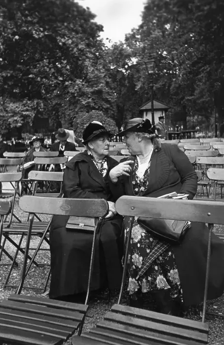 Framed Print : Band Fans. 7th October 1939: Two women gossiping during an interval in Framed Print : Band Fans. 7th October 1939: Two women gossiping during an interval in