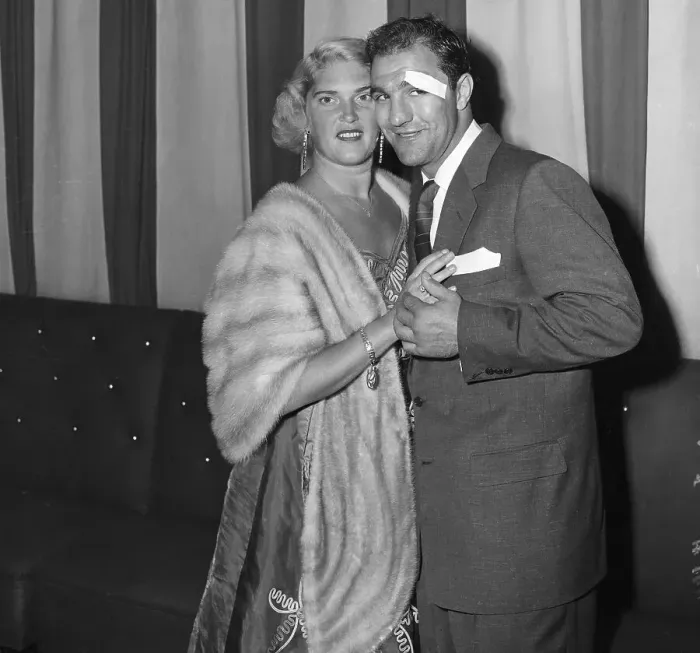 Framed Print : Bandaged Rocky Marciano Posing with Wife