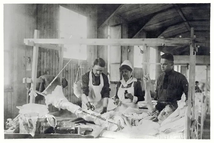 Framed Print : Bandaging a Soldier's Leg Framed Print : Bandaging a Soldier's Leg