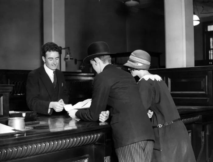 Framed Print : Bank Clerk Framed Print : Bank Clerk