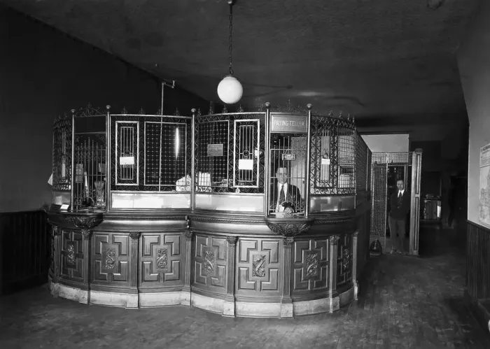 Framed Print : Bank Teller Cage with Typical Grillwork Framed Print : Bank Teller Cage with Typical Grillwork