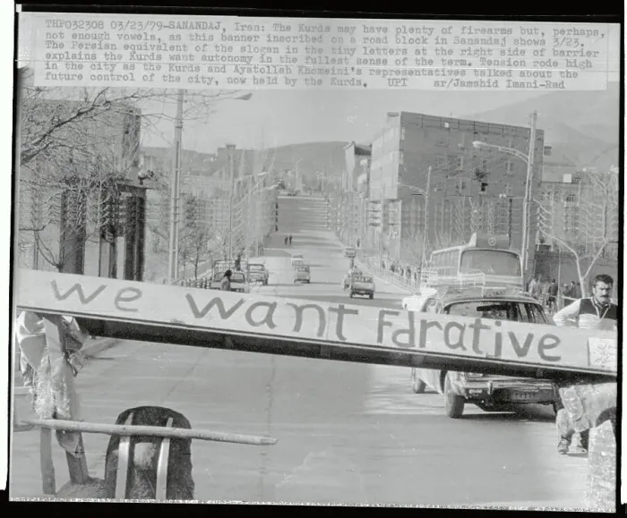 Framed Print : Banner Inscribed on Road Block in Sanadaj Framed Print : Banner Inscribed on Road Block in Sanadaj