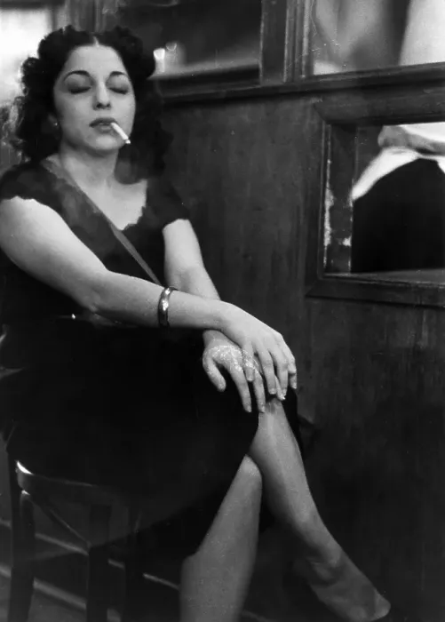 Framed Print : Bar Babe. 14th December 1951: A woman having a cigarette break by the service Framed Print : Bar Babe. 14th December 1951: A woman having a cigarette break by the service