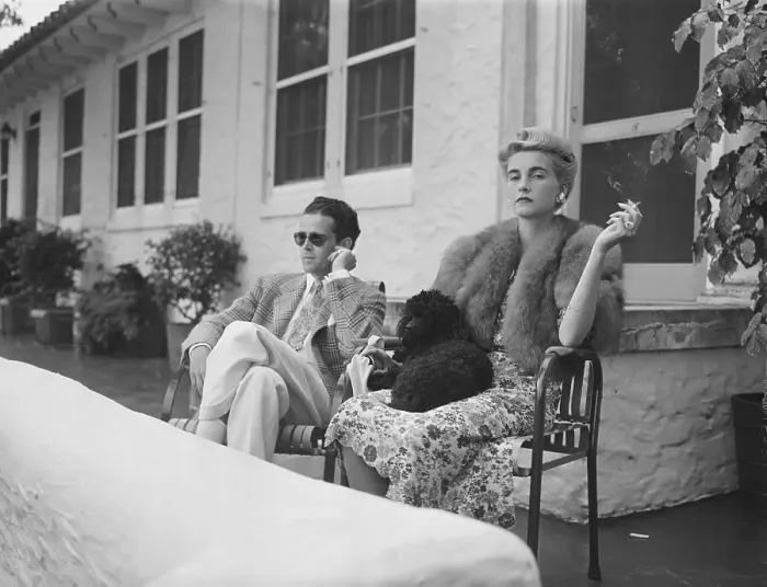 Framed Print : Barbara Hutton and Companion Relaxing on Patio Framed Print : Barbara Hutton and Companion Relaxing on Patio