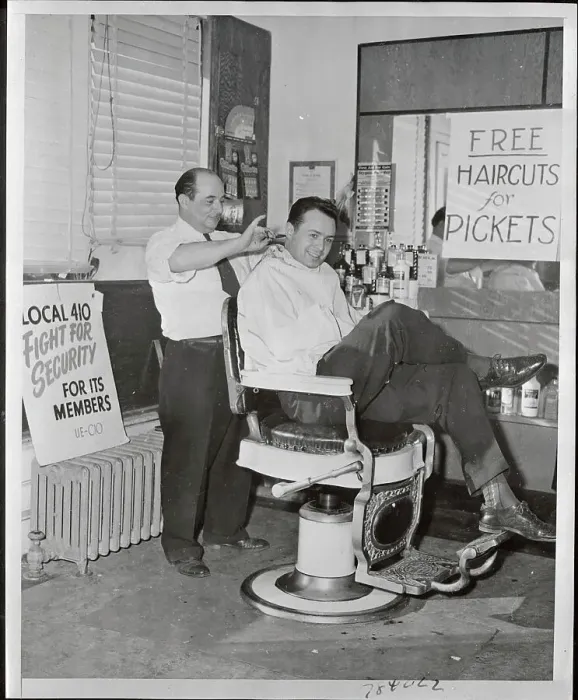 Framed Print : Barber Giving Free Haircut to Striker Framed Print : Barber Giving Free Haircut to Striker