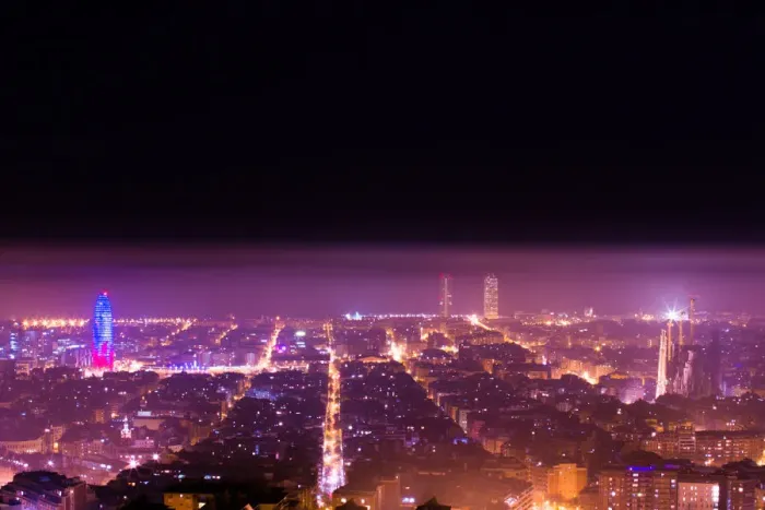 Framed Print : Barcelona cityscape with Sagrada Familia and Agbar tower illuminated at night between spring fog Framed Print : Barcelona cityscape with Sagrada Familia and Agbar tower illuminated at night between spring fog