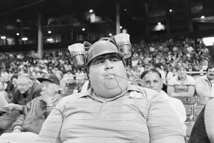 Framed Print : Baseball Fan Drinking From Beer Hat Framed Print : Baseball Fan Drinking From Beer Hat
