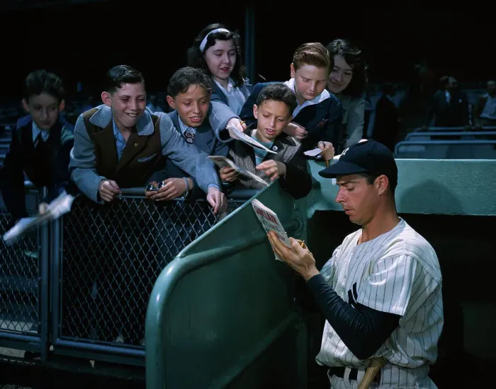 Framed Print : Baseball Legend Joe DiMaggio Signing Autographs for Youngsters