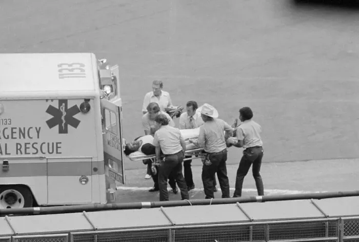 Framed Print : Baseball Pitcher Being Carried on Stretcher Framed Print : Baseball Pitcher Being Carried on Stretcher