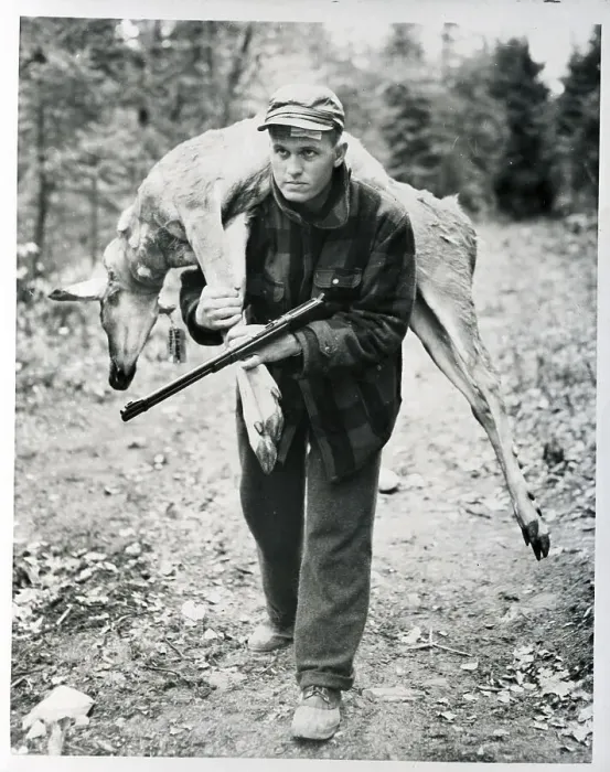 Framed Print : Baseball Player Carrying Deer Framed Print : Baseball Player Carrying Deer