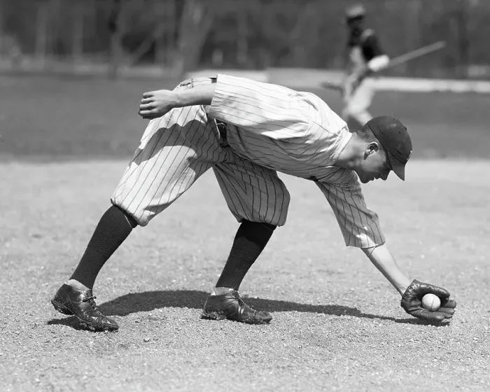 Framed Print : Baseball Player Fielding In Left Field