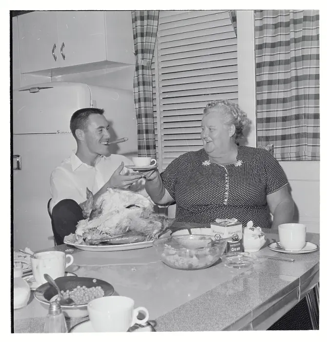 Framed Print : Baseball Player with his Mother in the Kitchen Framed Print : Baseball Player with his Mother in the Kitchen