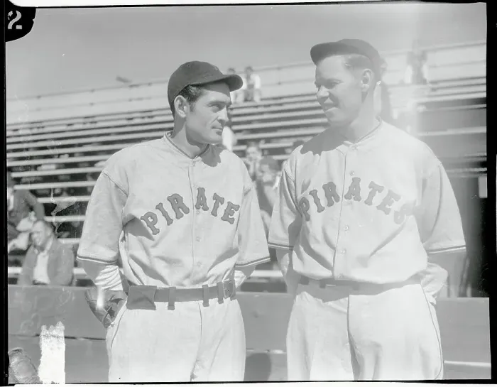 Framed Print : Baseball Players Guy Bush and Babe Herman Conversing Near Stands Framed Print : Baseball Players Guy Bush and Babe Herman Conversing Near Stands
