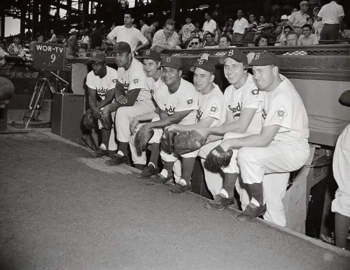 Framed Print : Baseball Players Standing in Dugout Framed Print : Baseball Players Standing in Dugout