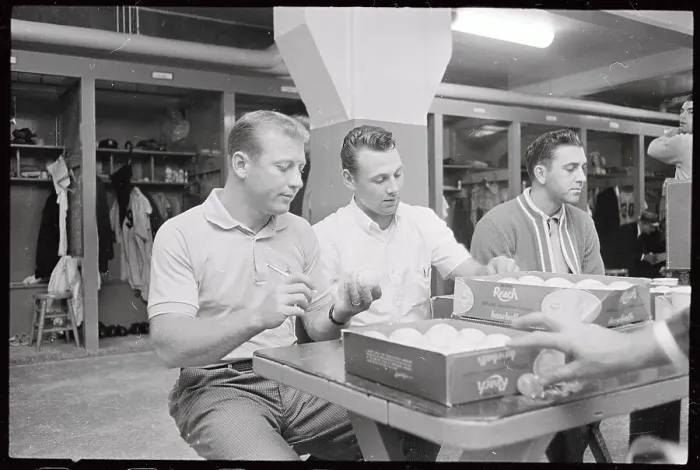 Framed Print : Baseball Players Taking it Easy During Game Postponement