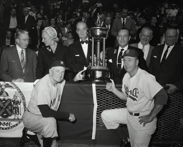 Framed Print : Baseball Players and Trophy